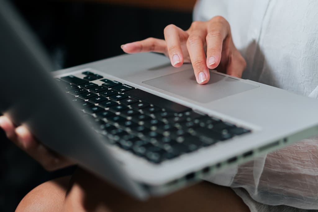 Man typing on laptop